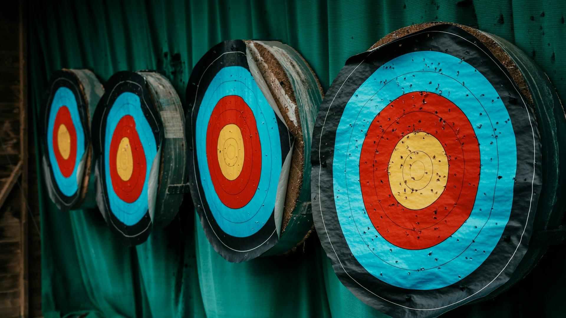 a group of arrows that are on a wall